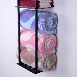 Black metal wall-mounted towel storage rack for bathroom and kitchen organization.