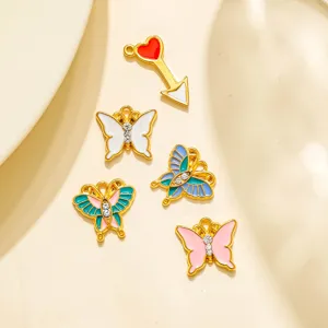 Pendentif Papillon Cœur Flèche en Acier Inoxydable Émaillé DIY Bijoux Porte-clés Étui Écouteurs Planificateur Charme Suspendu Strass