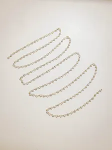 Stainless steel crystal chain detail showing sparkling beads for DIY jewelry and bag making.
