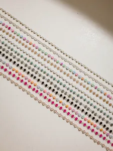 Detailed view of colorful crystal beaded chains, perfect for handmade DIY jewelry crafting.