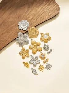 Stainless steel embossed flower charms DIY jewelry pendants in gold and silver finishes.