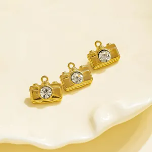 Gold camera pendant detail shot, rhinestone crystal lens charm for DIY jewelry making and keychains