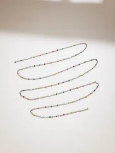 Close-up detail of stainless steel colorful candy bead fine chain for DIY crafts and jewelry.