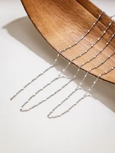 Stainless steel candy bead chain detail showing delicate white satellite design for DIY crafts.