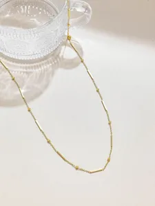 Stainless steel gold-colored station chain detail, perfect for DIY jewelry making and daily wear.
