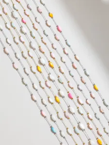 Colorful shell bead chain detail view, French style macaron DIY jewelry necklace making.