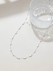 Macaron pastel shell beaded chain detailed showcase, elegant DIY jewelry accessory item.