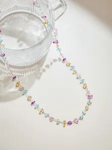 Colorful irregular gemstone beaded chain detail for DIY necklaces and phone charms.