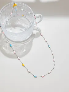 Delicate macaron colored shell rice bead chain detail, perfect for DIY jewelry crafting and accessories.