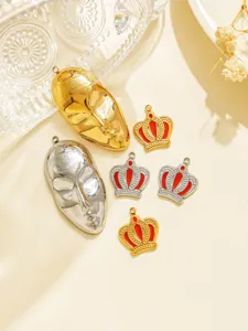 Stainless steel abstract face and crown pendants for DIY jewelry making and keychain charms.