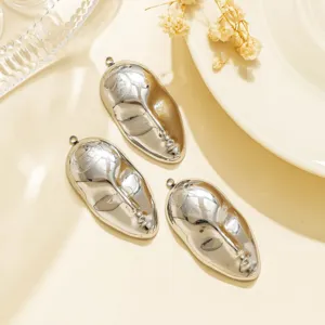 Stainless steel abstract face crown pendants, perfect for DIY jewelry and keychain accessories.
