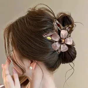 Elegante Blumen Haarkralle mit Metallrand und Marmormuster Blüten für stilvolles Hairstyling.