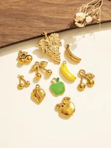 Stainless steel 3d fruit charms detail showing gold finish and enamel details for diy jewelry making.