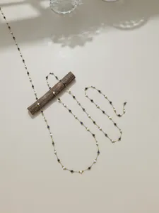 Detailed view of handmade crystal beaded stainless steel chain for DIY jewelry making.