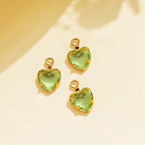 Green heart crystal pendants with gold claw settings, perfect for DIY jewelry making accessories.