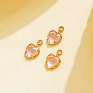 Pink heart crystal pendant stainless steel gold bezel DIY jewelry accessory detail view.