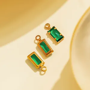 Detailed close-up view of French vintage green gemstone rectangular DIY jewelry pendant charms.