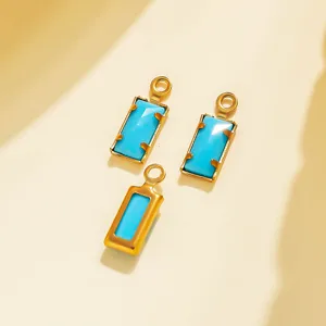 Close-up of rectangular stainless steel turquoise DIY charms, elegant geometric jewelry pendant.