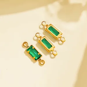 Geometric double-loop connectors with green gemstone and gold stainless steel rim for DIY jewelry.