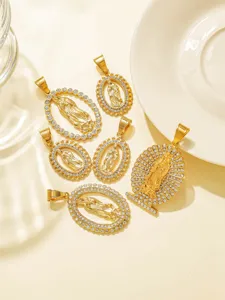 Detailed close-up shot of gold rhinestone Virgin Mary religious pendants, exquisite craftsmanship.