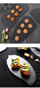 Detail view of irregular bamboo-shoot shaped slate dinner plate displaying delicious dessert food.
