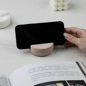 Nordic minimalist natural marble phone stand, pink desktop tablet holder for home office desk.