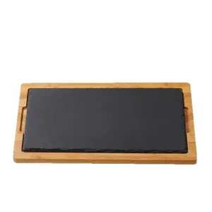 Rectangular black slate and bamboo serving tray for sushi, steak and restaurant plate.