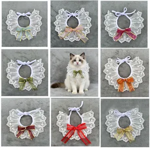 Cute lace cat pet collar with bow tie decoration, lovely dog bib neckwear detail view.