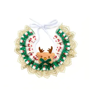 Christmas pet bib with cute plush reindeer, gold lace trim, and festive red-green printed fabric.