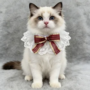Cute pet lace collar with red bow for cats and dogs, elegant pet bib accessory for daily wear.