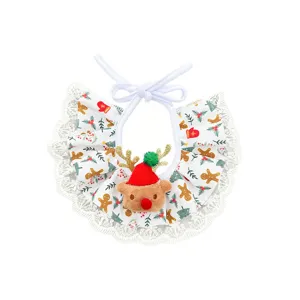 Christmas pet bib detail featuring a cute plush reindeer, gingerbread print, and delicate white lace.