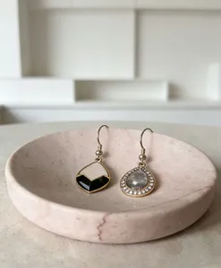 Detailed shot of the elegant pink natural marble round soap dish and tray, ideal for bathroom.