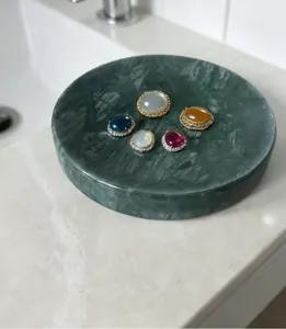 Natural marble round soap dish for bathroom sink, elegant green tray for home decor.