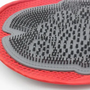 Pet bath brush grooming glove with soft silicone bristles and breathable red mesh for dogs cats.