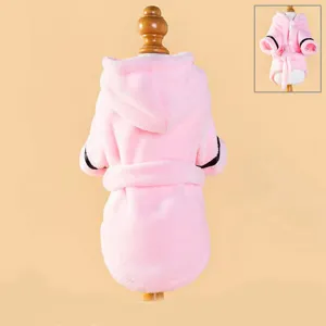 Pink soft plush pet bathrobe with hood and belt, warm absorbent dog sleepwear and drying towel.