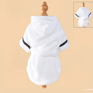 Detail view of white pet bathrobe with hood and black trim, soft fleece fabric for pets.