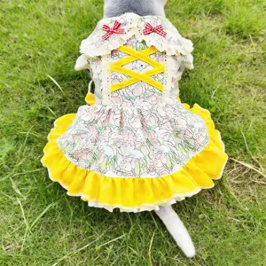 Cute Lolita pet dress with yellow ruffles and lace collar for small dogs and cats detail shot.
