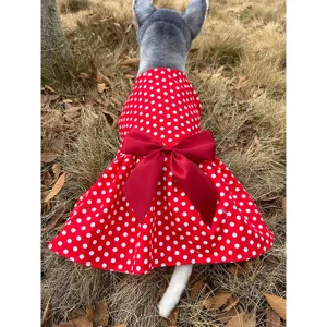 Cute red polka dot pet dress with a large bow for small dogs and cats outdoor wear style.