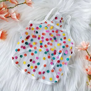 Detailed view of the cute pet mesh vest featuring colorful polka dots and white trim design.