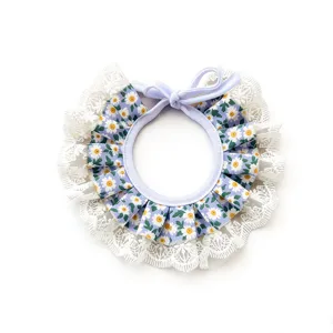 Close-up of the cute purple daisy floral pet bib featuring delicate white lace trim.