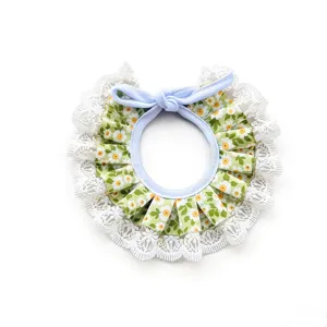Cute floral pet lace bib detail, green daisy print with white ruffles for small dogs cats.