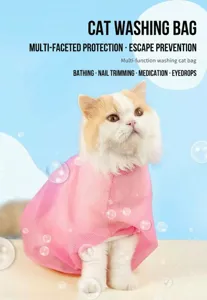 Detailed close-up view of the pink mesh cat washing bag, breathable fabric for pet grooming.