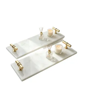 White marble decorative tray with gold handles for luxury home organization and bathroom vanity.