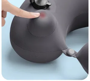 Detail view of the ergonomic inflatable travel neck pillow with press pump for easy travel comfort.