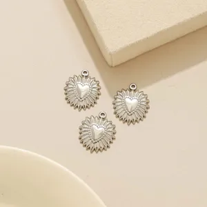 Ciondolo a cuore con raggio di sole vintage in acciaio inossidabile per creazione di gioielli.