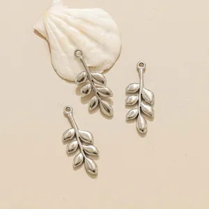 Stainless steel leaf pendant charms for DIY jewelry making, ideal for custom necklaces and earrings.
