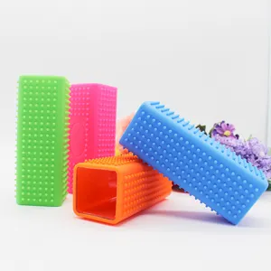 Silicone pet hair removal brush, multi-color rectangular cat and dog fur cleaning tool for home use.