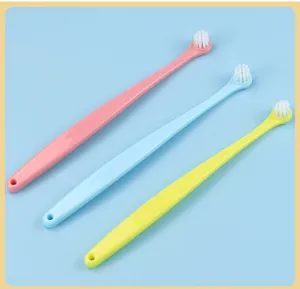 Round head pet toothbrush with soft bristles, ideal for cat and dog daily oral care and cleaning.