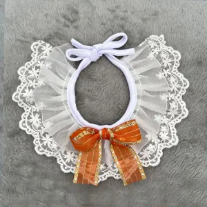 Cute lace pet collar with orange bow, delicate cat and dog bib, decorative neckwear accessory.