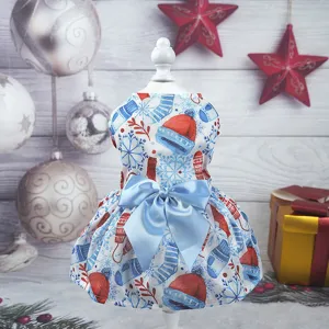 Christmas pet dog dress with cute snowflake print and blue bow, festive pet apparel detail.